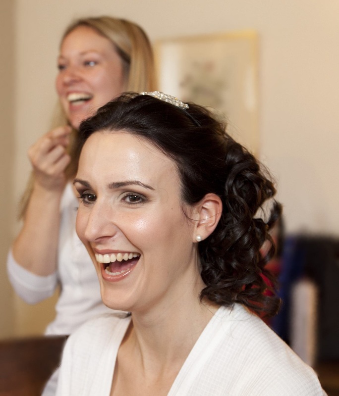Karen Lowe of Karen's Beautiful Brides laughing with the bride, best photo