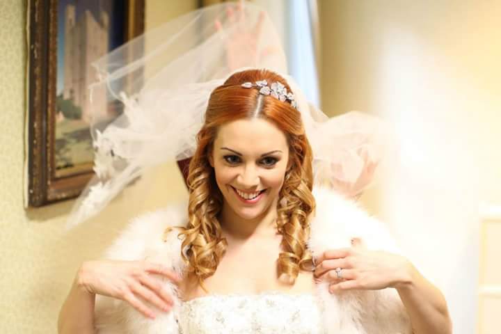 brides hair at wedding photoshoot in Hedingham Castle Essex