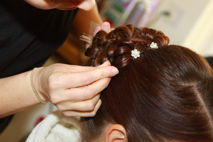 Suffolk wedding hairdresser Karen, of Karen's Beautiful Brides, creating a brides hair style