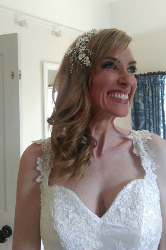 Photo of brides wedding hair down, by Karen's Beautiful Brides, Suffolk wedding hairdresser