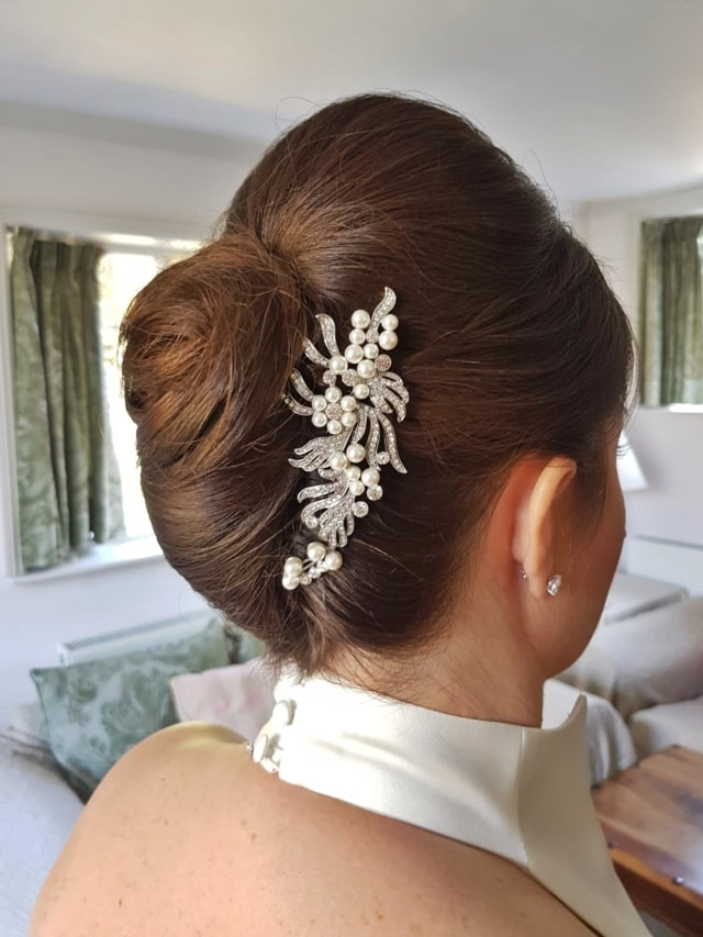 Brides sleek smooth chignon Wedding Hair 2019 