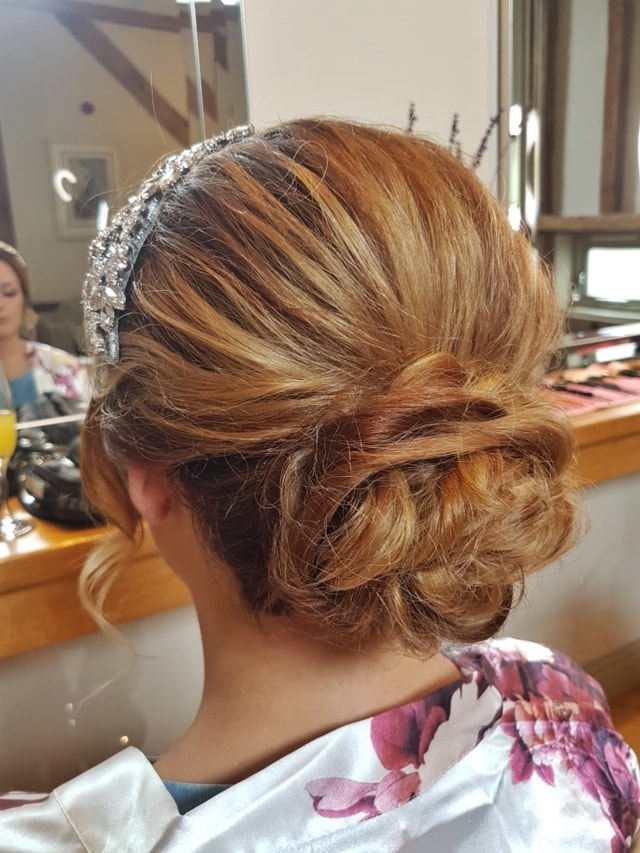 Brides textured bun Wedding Hair 2019  